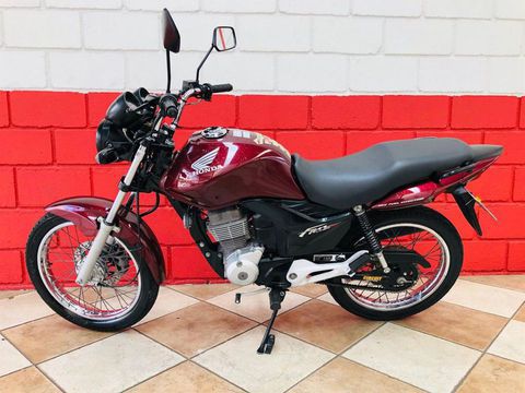 veiculo revisado de unico dono em dia com garantia com capacete em perfeito estado documento em dia watssapp 11937743041