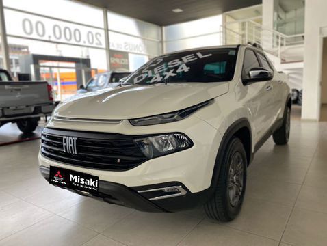 fiat toro 20 turbo endurance 4x4 at9 2022 carro macae rj toro 20 turbo endurance 4x4 at9 2021 20212021 cor branco cambio automatico combustivel diesel conforto e conveniencia ajuste do volante em altura ajuste do volante em profundidade ajuste eletrico dos retrovisores alcas de seguranca no teto ar quente ar condicionado banco do motorista com ajuste de altura banco traseiro bipartido banco traseiro rebativel cambio automatico comando interno do bocal de abastec comando interno do porta malas controle automatico de velocidade controle eletrico dos vidros dianteiros controle eletrico dos vidros traseiros destravamento remoto do porta malas direcao assistida limitador de velocidade luz no porta luvas luz no porta malas zonas de ar condicionado 1 entretenimento e informacao computador de bordo conexao bluetooth conexao usb conta giros espelhamento da tela do celular indicador de temperatura externa navegador gps radio termometro da agua do motor termometro do liquido de arrefecimento volante multifuncional seguranca ativa e passiva airbags frontais alarme antifurto perimetrico assistente de partida em rampa camera traseira para manobras cintos de 3 pontos para todos ocupantes cintos de tres pontos para todos os ocupantes controle automatico de descida controle de estabilidade controle de tracao desembacador do vidro traseiro encosto de cabeca para todos ocupantes encosto de cabeca para todos os ocupantes farois com refletores duplos farois de neblina freios abs isofix para fixacao de cadeira infantil monitoramento de pressao dos pneus repetidores laterais das luzes de direcao sensores de estacionamento traseiro tracao integral travamento central das portas fiat toro 2020 diesel pickup carro macae rj fiat toro 2020 diesel automatico pickup 13000 branco 4 portas alarme ar condicionado banco com regulagem de altura computador de bordo controle de tracao encosto de cabeca traseiro controle automatico de velocidade retrovisores eletricos rodas de liga leve sensor de chuva sensor de estacionamento volante com regulagem de altura bancos em couro tracao 4x4 gps airbag freio abs ar quente desembacador traseiro travas eletricas vidros eletricos direcao hidraulica turbo radio farol de neblina