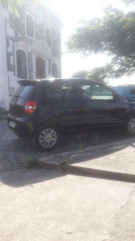 carro completo 
vidro elétrico 
trava eletrica 
retrovisor eletrico 
limpador traseiro
ar condicionado por sinal gelando muito
direção hidráulica 
documento no meu nome vistoriado 2020 no verdinho 
recibo aberto pronto par transferencia 
 2 portas 
motor 1.0
980291871 980925949 ou 21 24174497