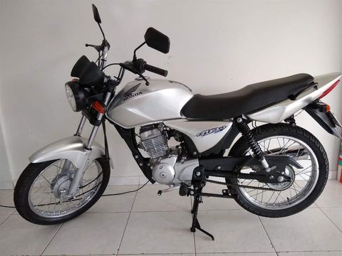com capacete chave copia da chave e manual  pneus novos documento em dia nao tem nada a fazer contato 11955962213 
