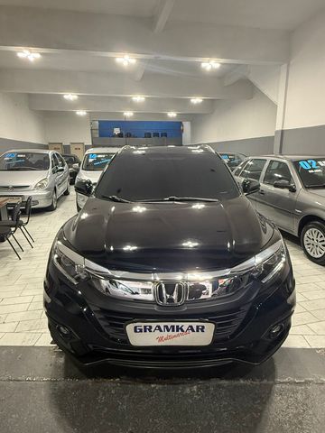 O Honda HR-V EX CVT  2020 ÚNICO DONO REVISÕES FEITAS EM CONCESSIONÁRIA COM APENAS 52.000 é um SUV compacto que oferece um bom equilíbrio entre espaço, conforto e tecnologia. Ele vem equipado com câmbio automático CVT, motor 1.8 FLEXONE  e uma série de recursos de série, como direção elétrica, ar condicionado digital e sistema de som com tela sensível ao toque. 
O Honda HR-V  é conhecido por seu bom acabamento, design moderno e bom desempenho. 
O HR-V  é um carro bastante procurado no mercado de usados, com boa valorização e baixa desvalorização. 
Se você busca um SUV compacto com bom espaço, conforto, tecnologia e bom desempenho, o Honda HR-V EX CVT 2020 é uma excelente opção. 
Veículo com perícia cautelar aprovada;
Totalmente revisado;
Sem detalhes!
E muito mais! Entre em contato e confira!
Aceitamos seu veiculo na troca, com a melhor avaliação do mercado! Avaliação justa e com transparência.
Fazemos financiamento em até 60x!(SUJEITO A ANÁLISE DE CRÉDITO) Com as melhores taxas do mercado.
Parcelamos sua entrada em até 24x no cartão
Aceitamos sua carta de crédito (SALVO ALGUMAS INSTITUIÇÕES)
GRAMKAR MULTIMARCAS , onde você encontra os melhores veículos, as melhores opções de usados e seminovos, nosso objetivo é sempre oferecer as melhores ofertas, com qualidade e confiabilidade de quem entende do assunto!!!
ESTAMOS LOCALIZADOS NA RUA JURUBATUBA 1347 CENTRO DE SÃO BERNARDO DO CAMPO SP
FALE AGORA MESMO COM UM DE NOSSOS CONSULTORES
SÃO MAIS DE 80 VEICULOS EM ESTOQUE
COMPRE SEU VEICULO COM QUEM ENTENDE DO ASSUNTO SÃO 28 ANOS DE TRADIÇÃO
E SEDE PRÓPRIA
GRUPO GRAMKAR MULTIMARCAS A CERTEZA DO MELHOR NEGÓCIO!!!
NOS RESERVAMOS NO DIREITO DE CORRIGIR QUALQUER TIPO DE ERROS DE DIGITAÇÃO