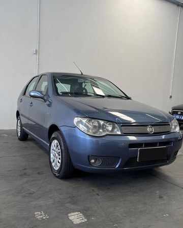 FIAT/PALIO  ELX 2005 1.3 COMPLETO-Azul

-AR CONDICIONADO 

-DIREÇÃO HIDRÁULICA 

-VIDROS ELÉTRICOS 

-TRAVAS ELÉTRICAS 

-CENTRAL MULTIMÍDIA 
