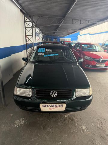 volkswagen santana 20mi gasolina 2000 carro sao bernardo do campo sp santana completo pneus novos so aqui na gramkar multimarcas voce encontra as melhores condicoes todos os veiculos revisados super valorizacao do seu usado na troca parcelamos a entrada no cartao de credito financiamos em ate 60x facilidade na aprovacao de credito valores sujeitos a alteracoes compre seu veiculo com quem entende do assunto sao 28 anos de tradicao e sede propria estamos localizados na rua jurubatuba 1347 centro de sao bernardo do campo sp grupo gramkar multimarcas a certeza do melhor negocio nos reservamos no direito de corrigir qualquer tipo de erro de digitacao volkswagen santana 2000 gasolina sedan carro sao bernardo do campo sp volkswagen santana 2000 gasolina manual sedan 126000 verde 4 portas alarme ar condicionado banco com regulagem de altura computador de bordo encosto de cabeca traseiro retrovisores eletricos volante com regulagem de altura ar quente desembacador traseiro travas eletricas vidros eletricos direcao hidraulica radio