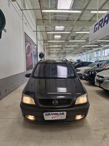 chevrolet zafira cd 20 gasolina 7 lugares 2002 carro sao bernardo do campo sp gramkar multimarcas seu jeito inteligente de comprar e vender veiculos veiculo impecavel para pessoas exigentes melhor opcao de 7 lugares da categoria muito confortavel e espacosa baixo km 159468 versao cd 20 gasolina mecanica com muitos acessorios alarme bancos com regulagem de altura encosto traseiro farois de neblina rodas de liga leve pneus novos rack de teto retrovisores eletricos trava eletrica central aprovamos seu credito em minutos trabalhamos com as menores taxas do mercado financiamos com e sem entrada em ate 60xsujeito a analise de credito parcelamos sua entrada no cartao de credito em ate 24x avaliamos seu carro em tempo real garantimos a melhor avaliacao do seu usado na troca aceitamos sua carta de creditosalvo algumas instituicoes gramkar multimarcas oferece o melhor negocio com taxas surpreendentes pra voce compre seu seu veiculo com quem entende do assunto sao 28 anos de tradicao e sede propria sao mais de 80 veiculos em estoque grupo gramkar multimarcas a certeza do melhor negocio nos reservamos no direito de corrigir qualquer tipo de erros de digitacao carro sao bernardo do campo sp chevrolet zafira 2002 gasolina manual suv 159000 cinza 4 portas alarme ar condicionado banco com regulagem de altura computador de bordo encosto de cabeca traseiro retrovisores eletricos rodas de liga leve volante com regulagem de altura ar quente desembacador traseiro travas eletricas vidros eletricos direcao hidraulica cd player