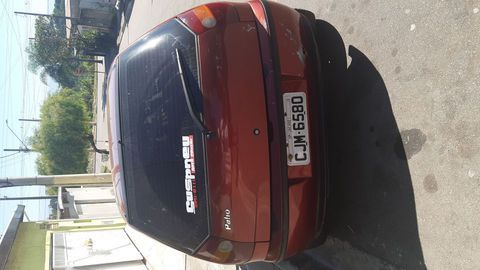 Palio 97.98 Motor não bate não fuma 
Só tem 1 Licenciamento não têm multa 
Recibo na mão 
Carro tem detalhe básico
Troca o cabo do velocímetro custa na faxa de 30$ 
Está na suspensão a rosca farol de milha
Só na terceira marcha ela arranha bem mais bem pouquinho nem da pra perceber 
O mecânico falo que é falta de completa o óleo 